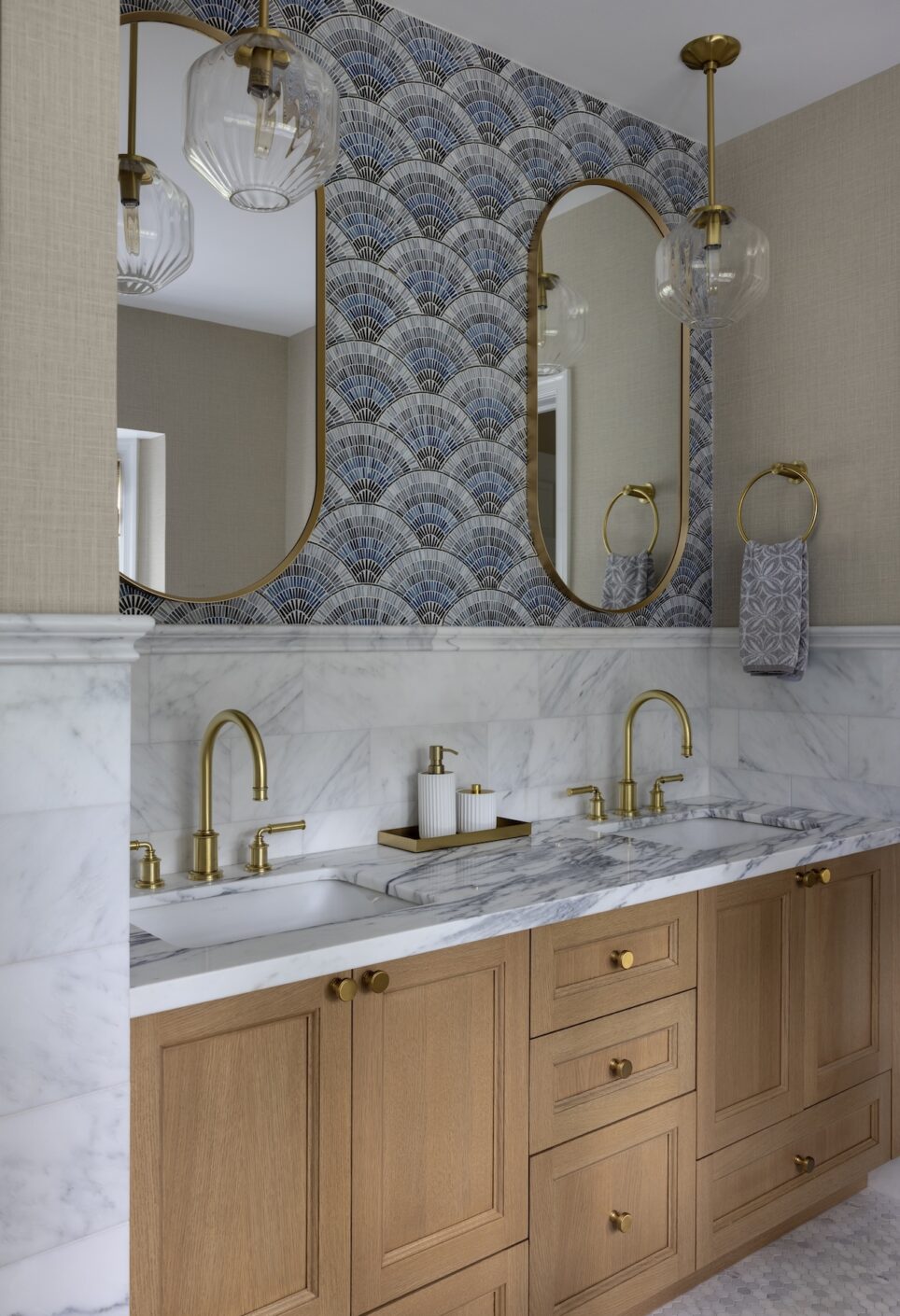 Primary Bathroom Vanity With Soft Tone Wood Cabinets