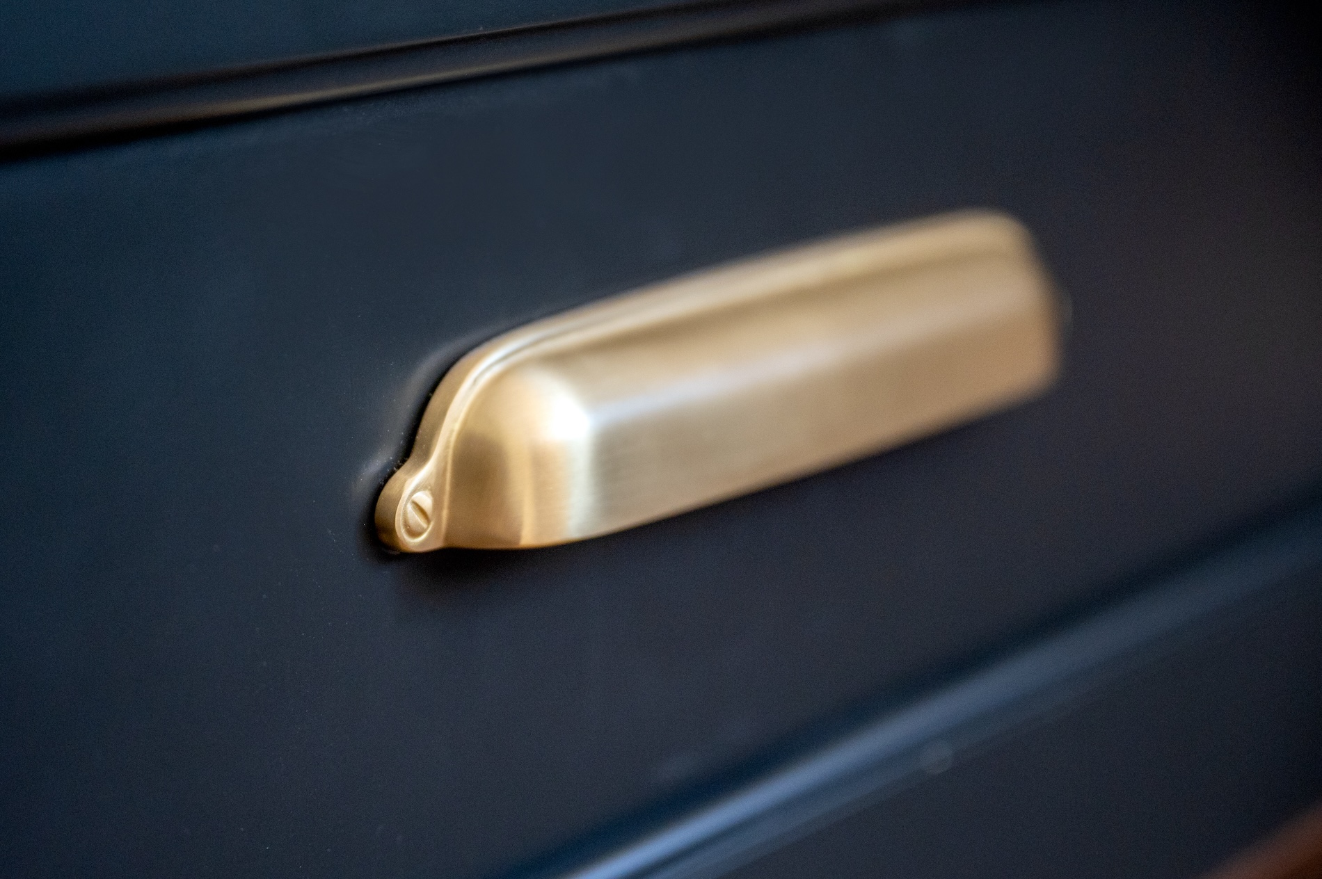 Gold Cabinetry Hardware On Black Cabinets