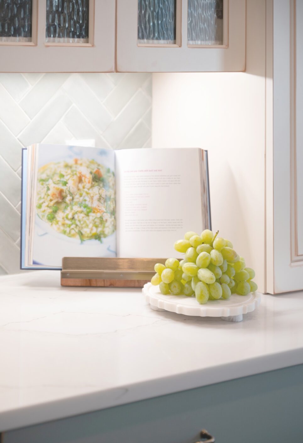 Green Grapes On Marble Stand With Cookbook