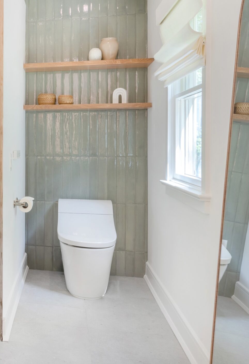 Sage Green Tile Backsplash Behind Toilet