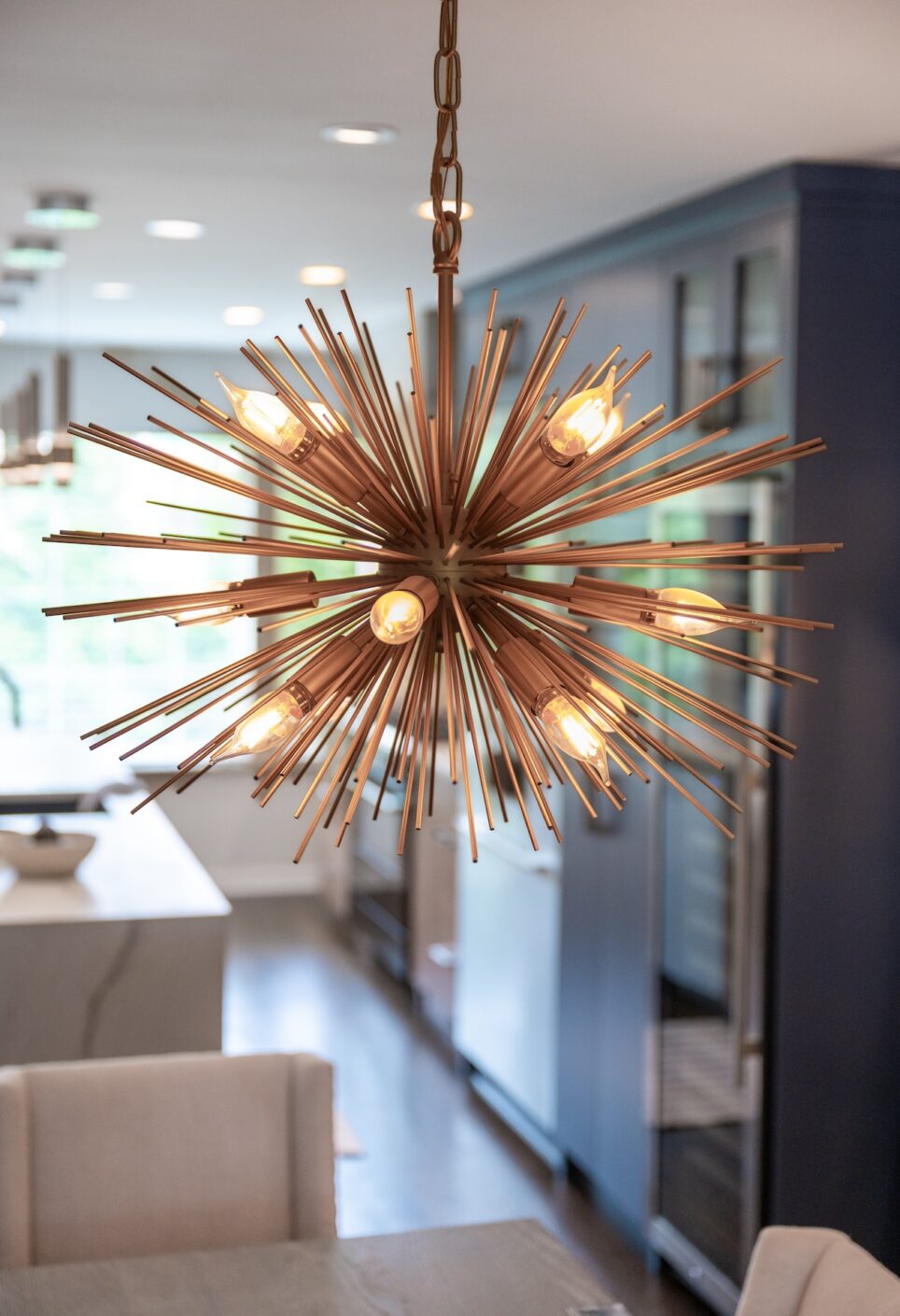 Spiky Lighting Chandelier Over Dining Table