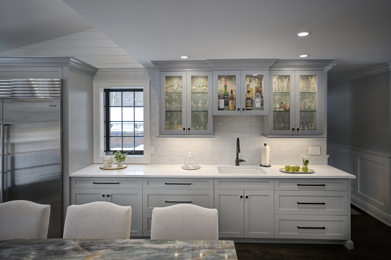 Wet Bar With Glass Front Cabinetry