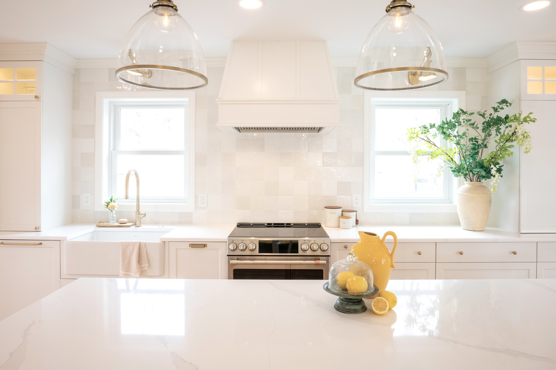 White Countertops Light Filled Kitchen Design