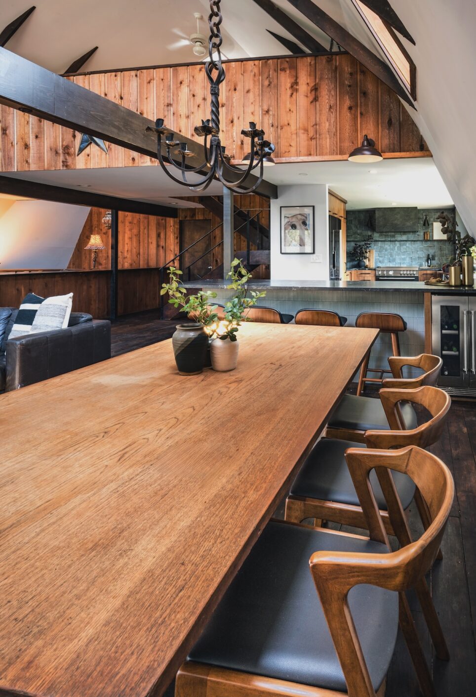 Wood Dining Table With Wood And Black Chairs
