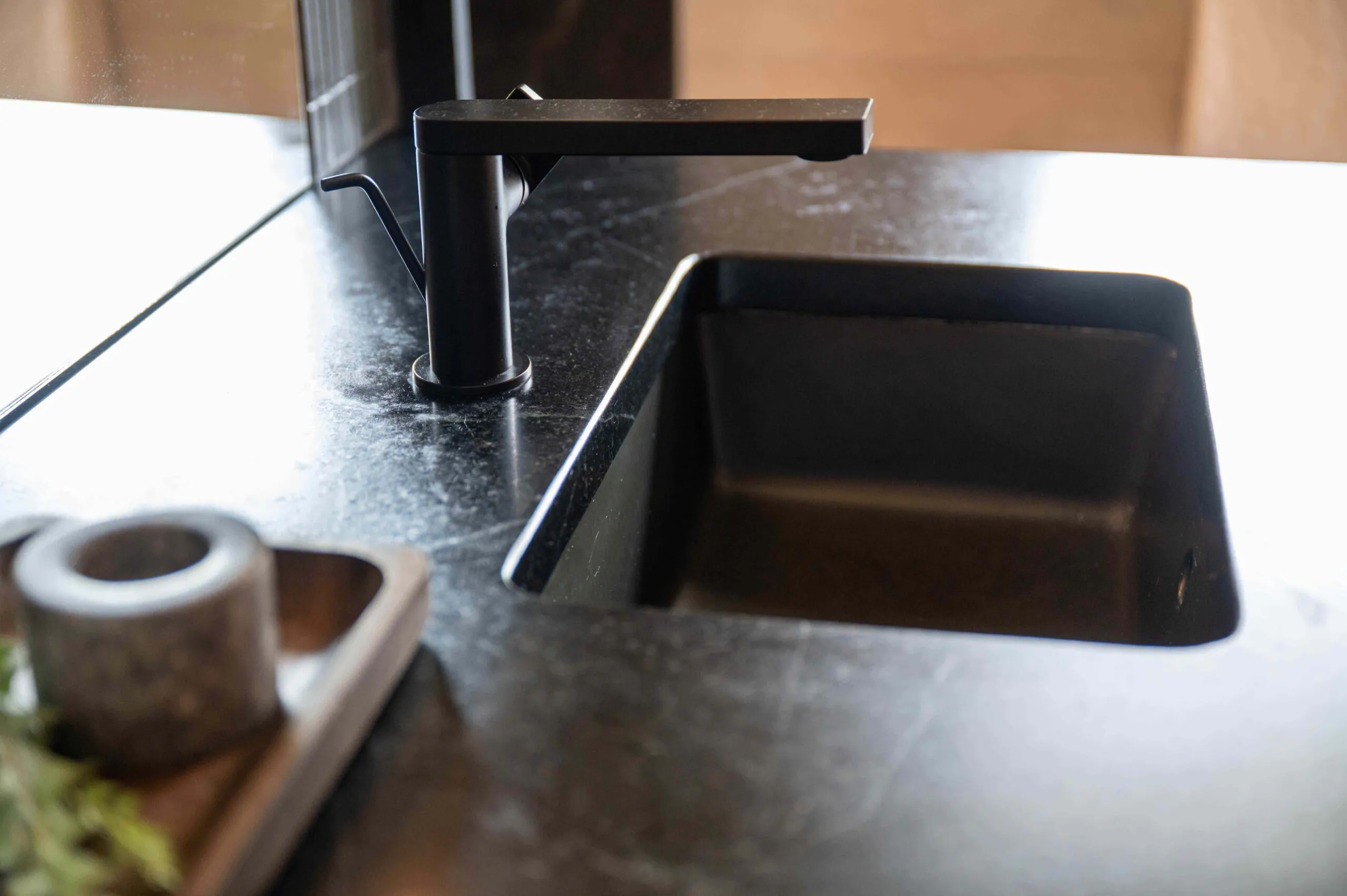 Black Countertop And Black Faucet