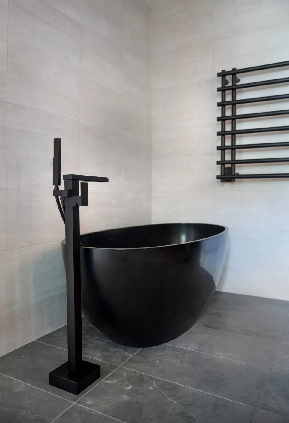 Black Stand Alone Tub With Towel Warmer
