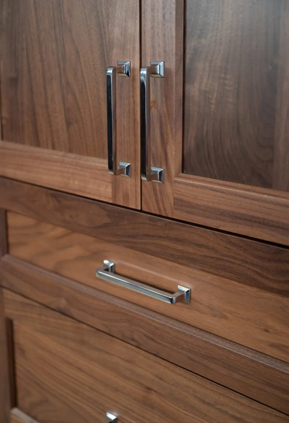 Walnut Kitchen Cabinetry With Silver Hardware